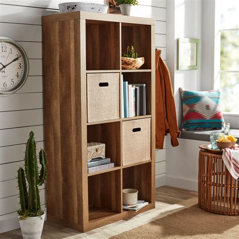 Secured solidly to wall with included brackets and separately purchased screws and washers as adequate ones. . Cube storage organizer